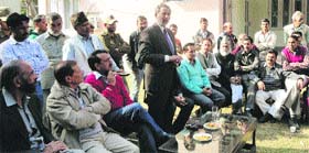 Minister for Higher Education, Labour and Employment Abdul Ghani Malik addresses sarpanches and panches during a meeting in Reasi on Tuesday