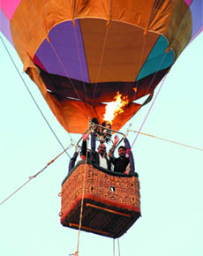 People enjoy a ride on a hot-air balloon during the ongoing adventure sports carnival at Lake No. 3 on Wednesday. 