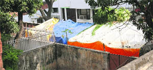  	Structures outside Shashi Kants house intact