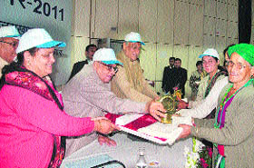 The recipients of the Nirmal gram awards in Dehradun on Wednesday. 
