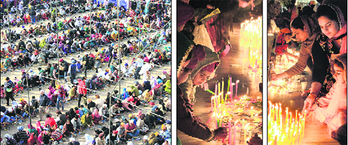 Devotees partake of langar; and light candles on the birth anniversary of Guru Nanak Dev at a gurdwara in Jalandhar on Wednesday