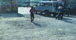 The pot-holed road outside the main gate of the bus stand in Fazilka has been causing inconvenience to the commuters.