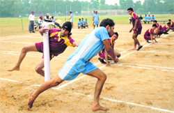 A match in progress during the Panjab University Inter-College Kho-Kho Championship at the PU in Chandigarh on Thursday