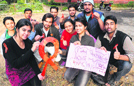 PU students in a cheerful mood after undergoing an HIV test in Chandigarh on Thursday. 