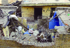 A house damaged after a cylinder blast at New Ashok Nagar in New Delhi@@on Thursday.