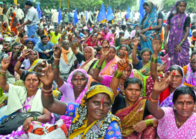Activists of Republican Party of India shout slogans during a demonstration to protest against the FDI and price hike, at Jantar Mantar in New Delhi on Thursday.