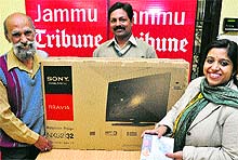 Winners of a Tribune contest at The Tribune office in Jammu on Thursday
