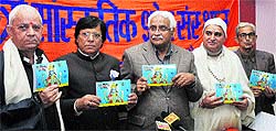 MLC Vijay Bakaya (centre) releases the 329th edition of the Vijayshwar Panchang in Jammu on Thursday