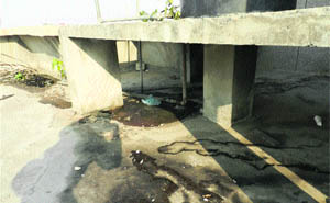 Area around one of the water tanks that was being used as a urinal 
