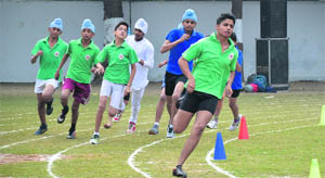 Students take part in a race on the opening day of the annual athletics meet at Guru Nanak Public School, Sarabha Nagar, Ludhiana, on Thursday. 