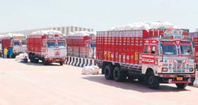 A file photograph of trucks carrying goods lined up at the Attari ICP