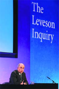 Lord Justice Brian Leveson delivers his findings into the Leveson Report, which is based on a major inquiry set up after the phone-hacking scandal, at the Queen Elizabeth II centre in London on Thursday