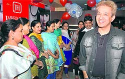 Famous hairstylist Jawed Habib is all smiles during the launch of his Golden Scissor Saloon in Amritsar on Friday