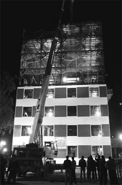 Construction work under way on a 10-storeyed building in Mohali on Friday.