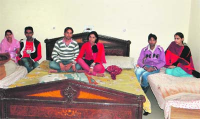 Three couples in a single room at the protection house in Panchkula. 