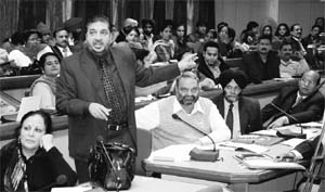 A principal speaks during a meeting at the PU in Chandigarh on Friday. 