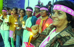 Women participate in a candle march on the concluding day of Jan Sansad at Jantar Mantar in New Delhi on Friday. Tribune photo: Manas Ranjan Bhui
