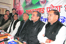Chief Minister Vijay Bahuguna, along with Congress general secretary Birender Singh, and chief of the state unit of the party Yashpal Arya, at a press conference in Dehradun on Friday.