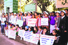 Members of the Mamta social organisation during an awareness rally on AIDS at Gandhi Park in Dehradun on Friday.
