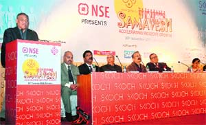 Chief Minister Vijay Bahuguna speaks at a seminar organised by the Skoch Development Foundation in Dehradun on Friday. 