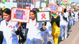 Students of St Soldier Nursing Institute take out an AIDS awareness rally to mark World AIDS Day in Jalandhar on Friday. 