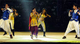 Punjabi singer Miss Pooja performs at the opening ceremony.