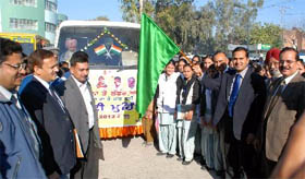 Deputy Commissioner KK Yadav flags off the door-to-door cancer detection campaign that began on Saturday. Civil Surgeon Dr Ajay Sahni (first from right) was also present on the occasion along with other officials.