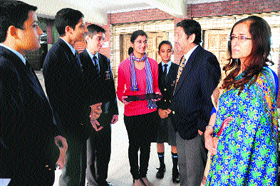 Parents of Sergeant Uday Singh interact with students at St Stephen's School on Saturday. 