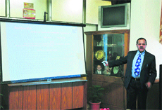 Ashok Sharma, Inspector-General of Police, Vigilance and Anti-Corruption Bureau, addresses mediapersons in Shimla on Saturday.