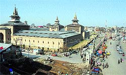 People move out to buy essentials after the curfew was lifted from Srinagar
