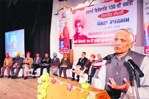 Dr Bajrang Lal Gupta delivers an address on the 150th birth anniversary of Swami Vivekanand at Guru Nanak Auditorium in Amritsar on Sunday.