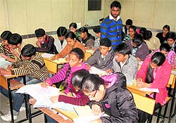 Students appear for a national talent hunt exam at a centre in Sector 34, Chandigarh, on Sunday