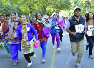 People participate in an All-India Run, organised by India HIV/AIDS Alliance to observe World AIDS Day in New Delhi on Sunday. 