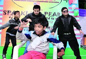 Children take part in a cultural programme in Haridwar on Sunday.