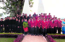 Students of Doon International School and members of the Purukul Youth Development Society at Khalanga War Memorial during a heritage walk organised by SpicMacay in Dehradun on Sunday.