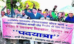 Members of the Uttarakhand Bachao Sangharsh Samiti take out a march from Haridwar to Dehradun to demand the construction of the Ramnagar-Kotdwar road on Sunday