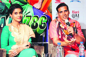 Bollywood actors Akshay Kumar and Asin at a promotional event for their upcoming film Khiladi 786 in Gurgaon on Sunday. 