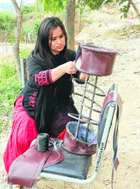 A student makes a craft design at NIFT in Kangra on Sunday.