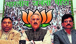 State BJP president Shamsher Singh Manhas addresses a press conference at the party office in Jammu on Sunday