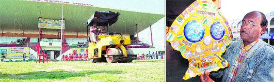 Final preparations ahead of the World Cup Kabaddi matches at the Guru Nanak Dev Stadium in Amritsar on Monday; (right) Artist Jagmohan Kanojia with a kite he made that shows flags of the participating countries. 