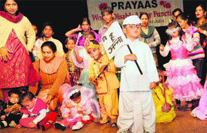 Differently abled children from Sector 38-based rehabilitation centre Prayaas participate in a fancy dress competition at Bal Bhawan in Sector 23, Chandigarh, on Monday.