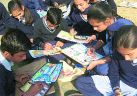 Students participate in a painting competition to mark National Anti-Pollution Day at Government Model Senior Secondary School, Sector 46-D, Chandigarh, on Monday.