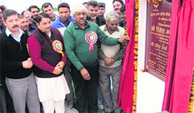 Sports Minister Dinesh Agarwal inaugurates a boxing ring at Maharana Partap Sports College in Dehradun on Monday.