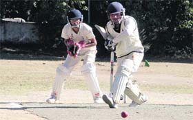 A batsman plays a shot in match in the Beehive Inter College Cricket Tournament in Dehradun on Monday.