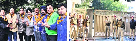 Winners of the Jullundur Gymkhana Club poll in a jubilant mood; and (right) cops deployed at the club during the recounting of votes, a day after the poll in Jalandhar on Monday