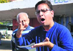 Members of the J&K Association of the Deaf hold a protest in Jammu on Monday.