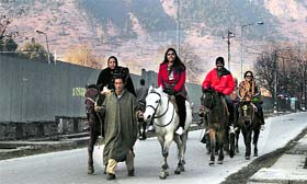 Tourists on way towards Pahalgam resort in Anantnag district.