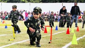 Children of Bal Bharti School take part in a race during the annual athletics meet in Ludhiana on Monday
