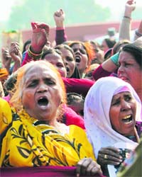 Survivors of the 1984 Union Carbide disaster protest at Vijay Chowk in New Delhi on Monday