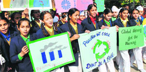 School children hold an awarness rally on  World Pollution Prevention Day in Patiala, on Monday. 